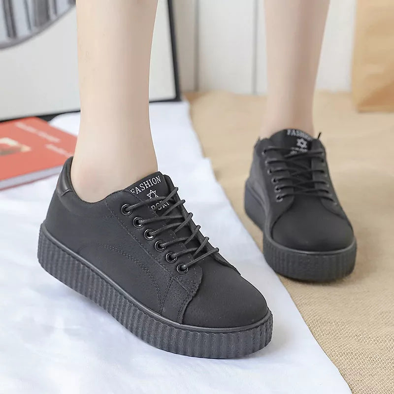 Women's black and khaki lace-up sports shoes with thick rubber sole