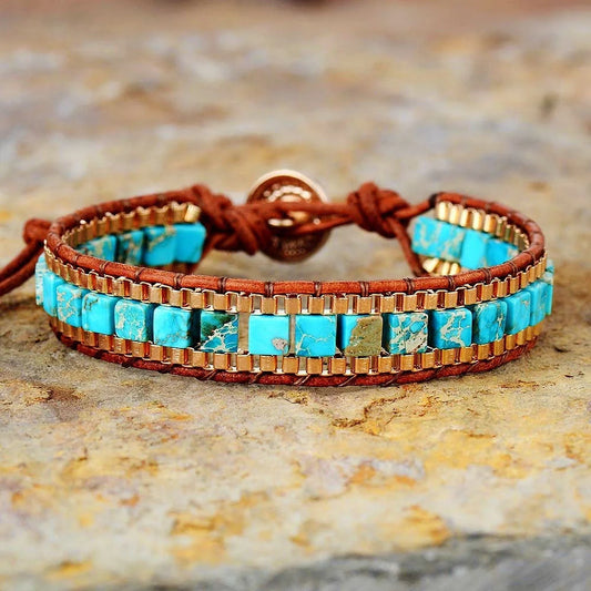 Hand-woven blue leather bracelet with imperial stone detail