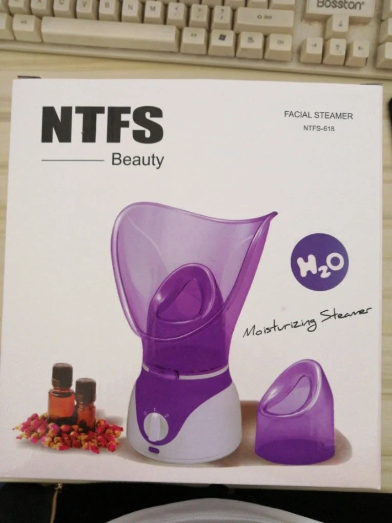 Purple facial steamer with dual conical cones for deep pore cleansing