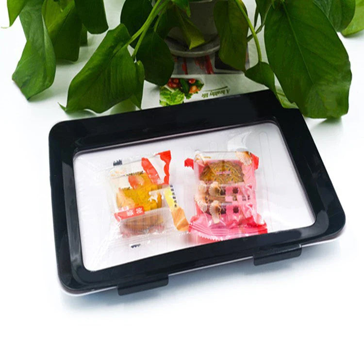 Premium food-preserving vacuum trays for fridge storage in black, green, red, and gold colours