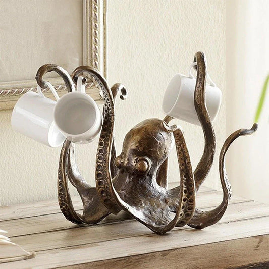 Decorative resin octopus tea cup holder with a realistic and intricate design, perfect for adding a playful touch to your home or office decor.