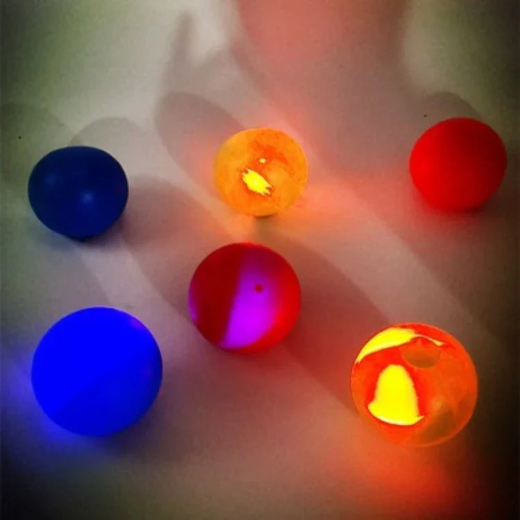 Premium Luminous Sticky Stress Relief Balls in various colors and sizes, with a glow-in-the-dark feature for a captivating and soothing relaxation experience.