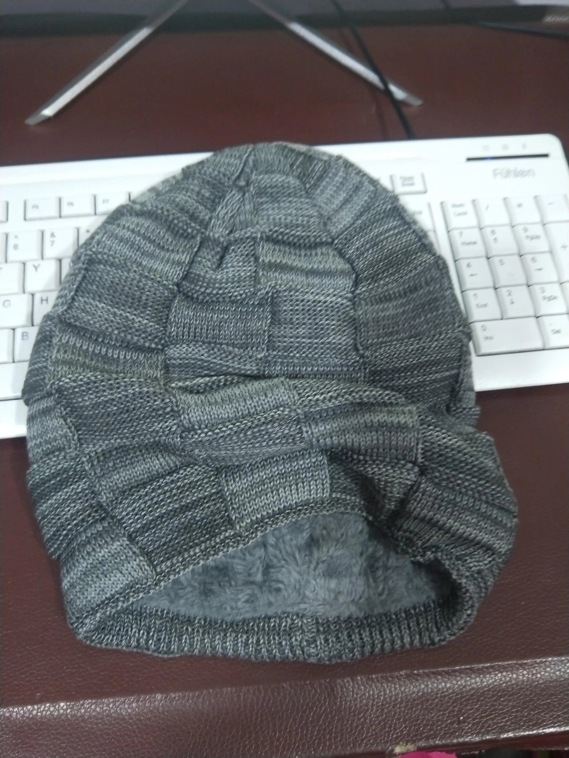Unisex wool knitted beanie in various colours for winter warmth