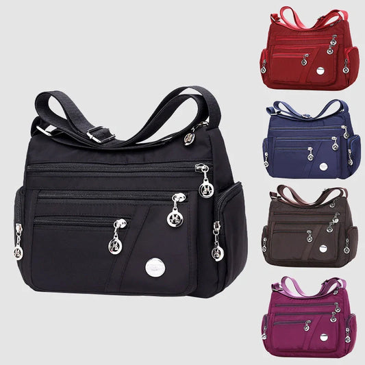 Ladies waterproof nylon oxford crossbody bag in various colors with multi-layer storage