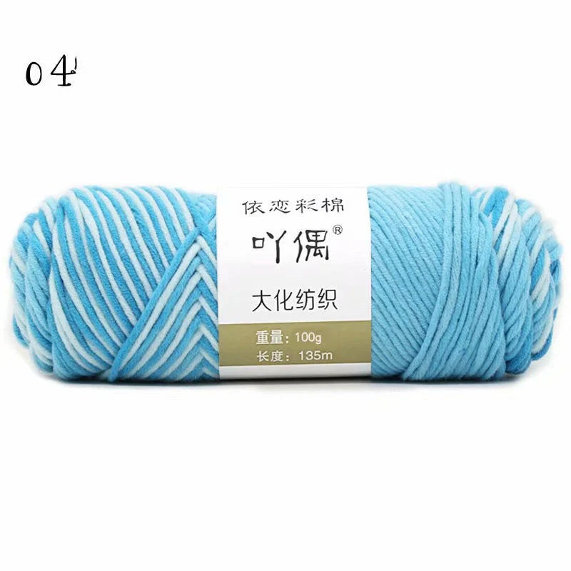 Luxurious gradient milk cotton yarn balls in a variety of vibrant colours, perfect for knitting, weaving, and other textile crafts.