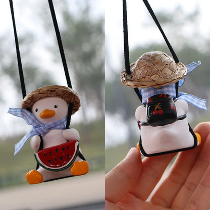 Car Swing Duck Ornament hanging from rearview mirror