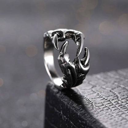 Striking open dragon claw ring made from premium titanium steel, with a lustrous chrome-like finish and adjustable, comfortable fit