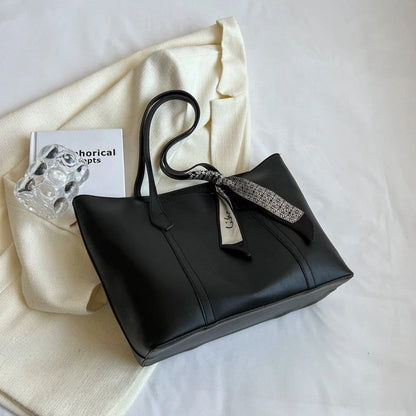 Stylish large capacity tote bag in various colours, perfect for fashion and functionality