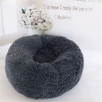 Cosy round plush cat mattress for winter warmth, available in various colours and sizes