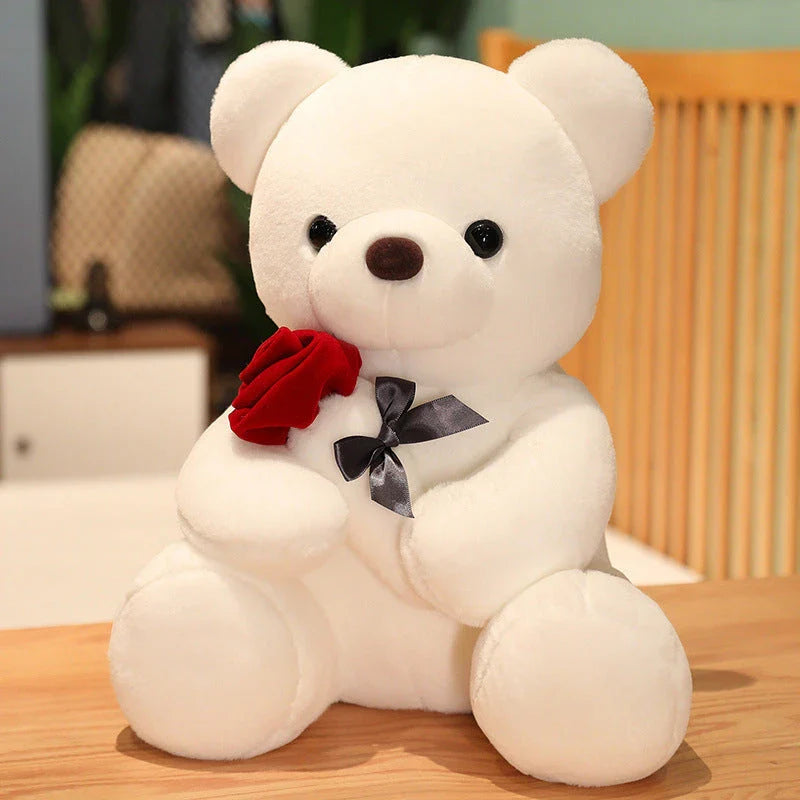 Soft and huggable teddy bear plush pillow in brown, beige, and grey colors