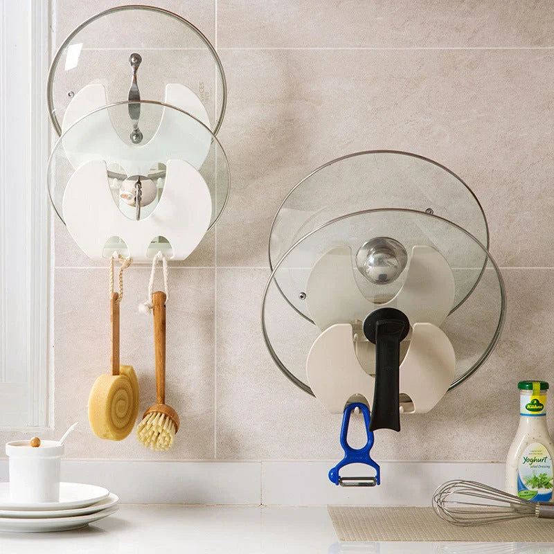 Wall-mounted kitchen organiser with double-layer storage and hooks for utensils