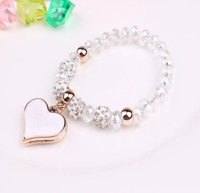 Elegant crystal heart-shaped bracelets in various vibrant colours, perfect for adding a touch of sophistication to any outfit