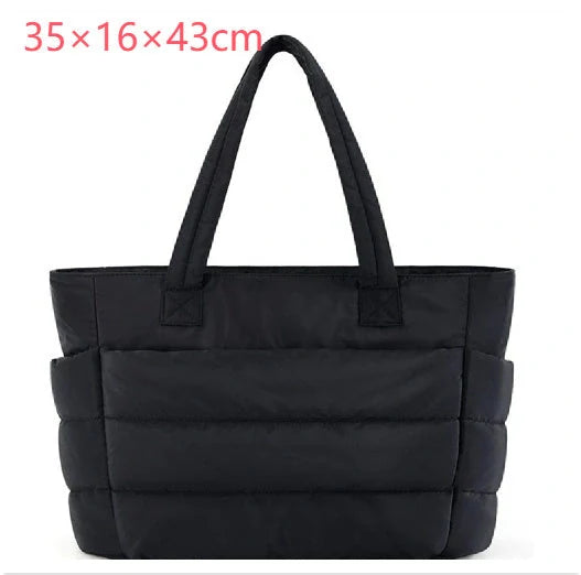 Premium cotton handbag with spacious design, secure zip-top closure, and thoughtful interior organisation for daily use