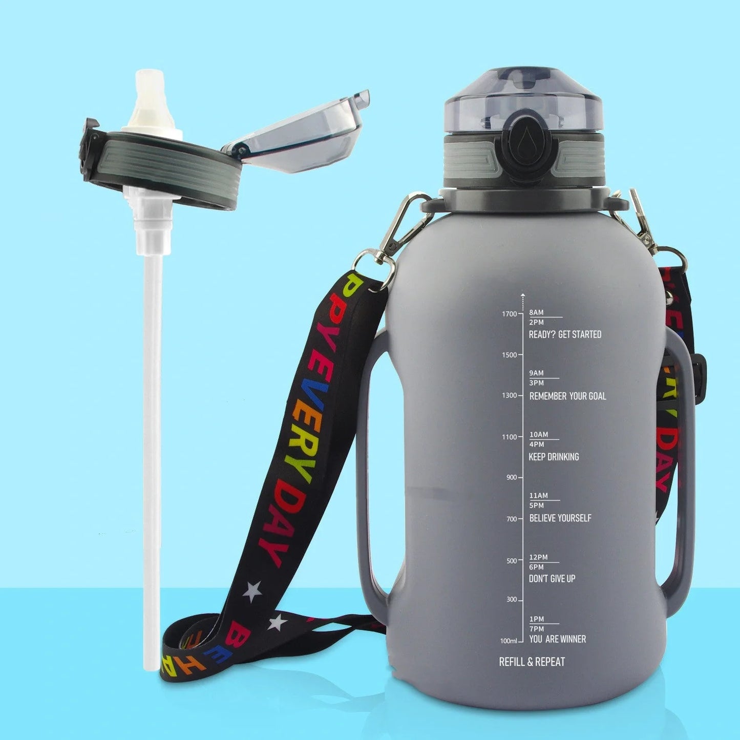 Collapsible silicone water bottle in black, green, and pink with leak-proof cap