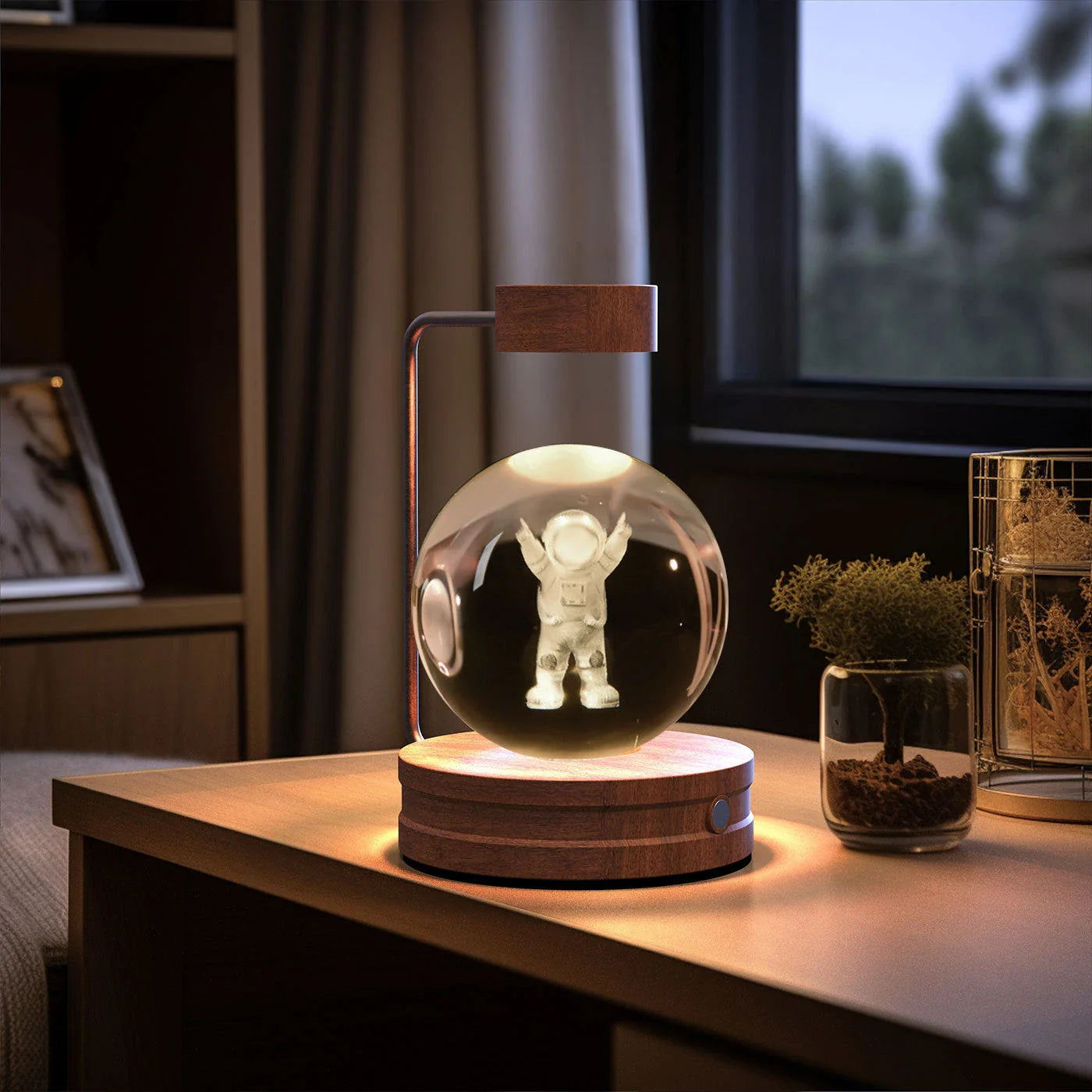 Enchanting crystal ball night light with cosmic designs, creating a warm and soothing ambiance in any room.