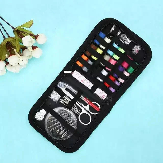 Compact home sewing kit with 98 accessories including needles, threads, scissors, and more