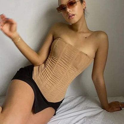Versatile sleeveless crop corset tank top for women in various colors and sizes, featuring a unique backless, gauze-inspired design for a contemporary, fashionable look.