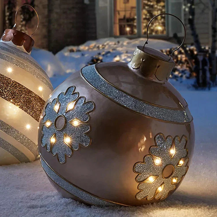 Inflatable Christmas baubles in various festive designs for outdoor holiday decoration