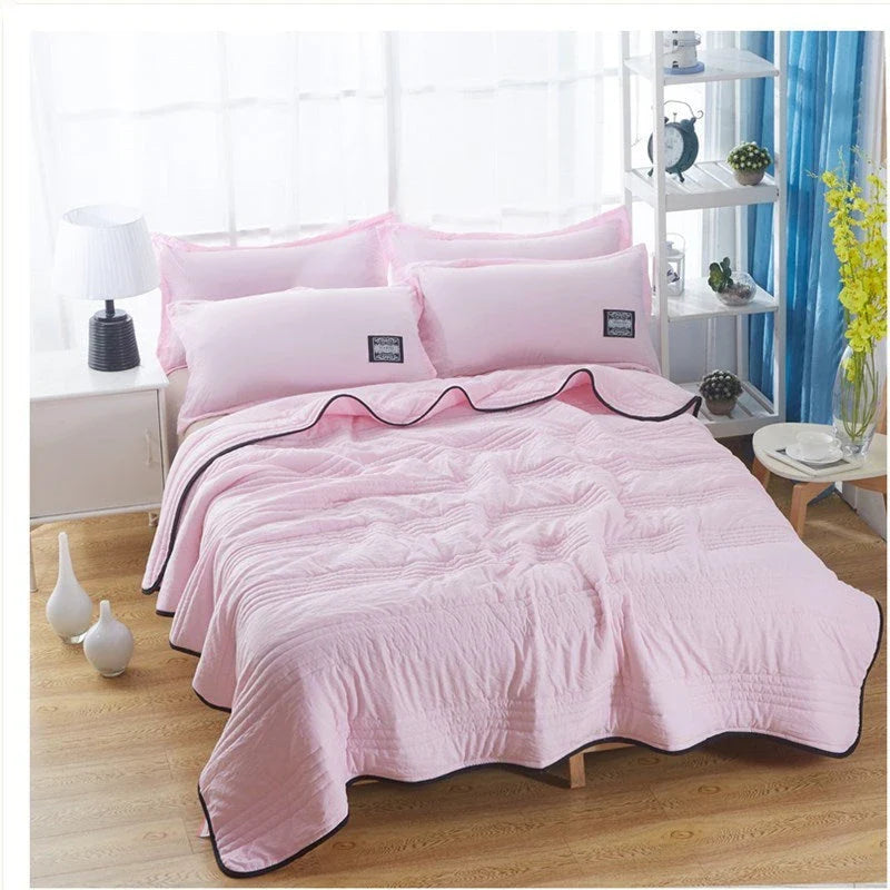 Premium cooling quilts in various colors and sizes for comfortable, temperature-regulating sleep