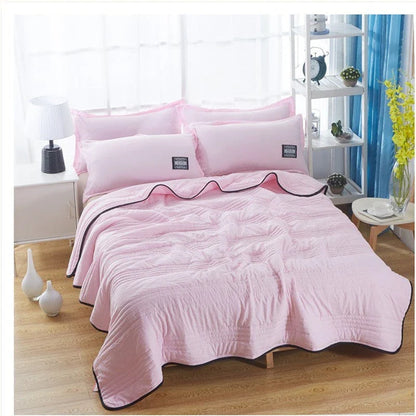 Premium cooling quilts in various colors and sizes for comfortable, temperature-regulating sleep