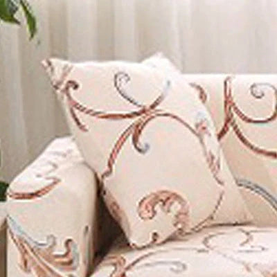 Stretchable geometric print sofa cover on a three-seater sofa