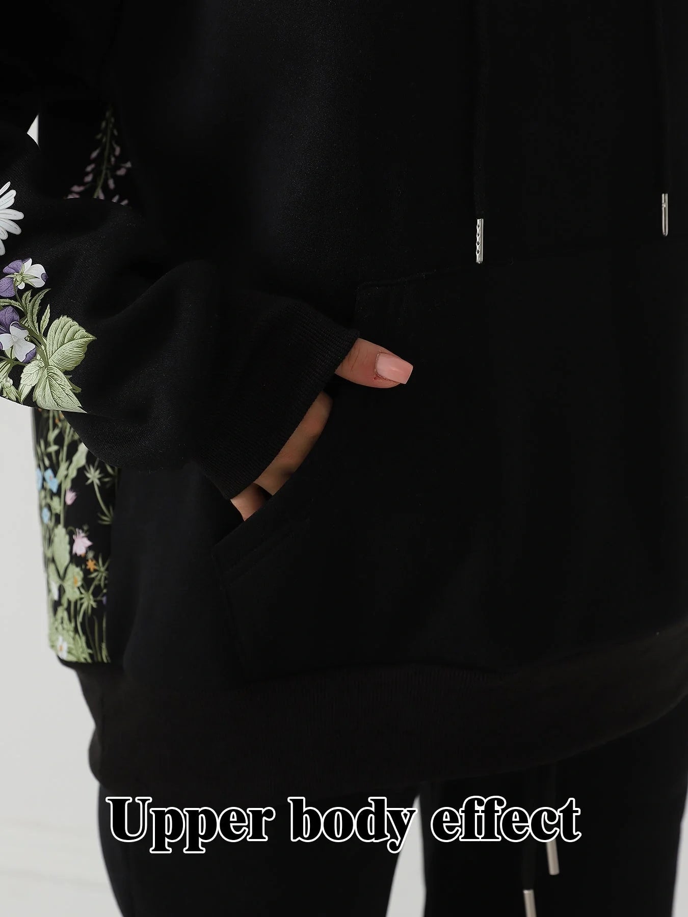 Women's floral long sleeved sweatshirt in black, blue, and apricot