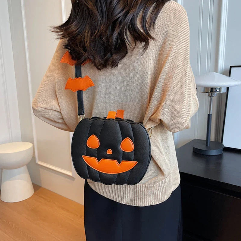 Stylish Halloween shoulder bag with pumpkin cartoon and bat design, available in various color options