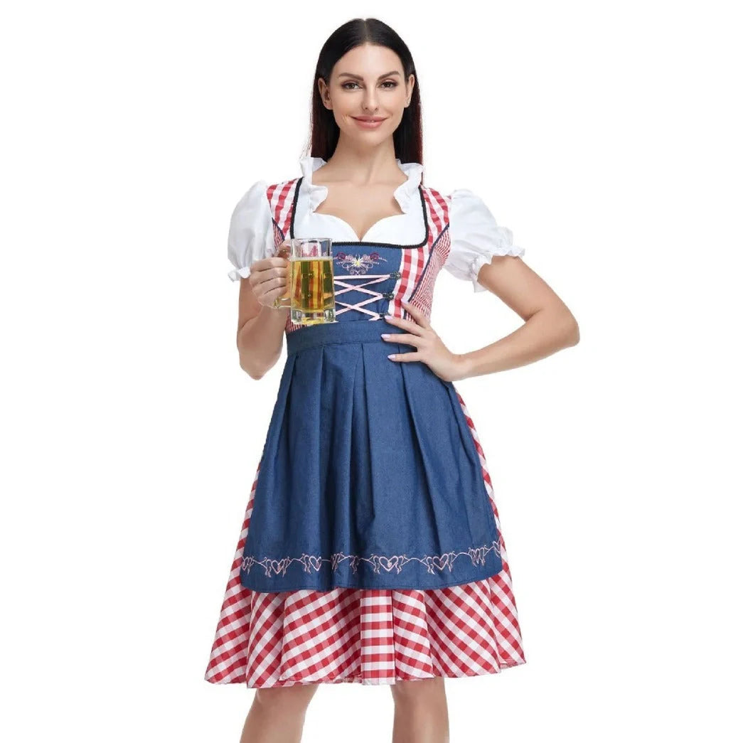 Traditional Oktoberfest ethnic dress for women in vibrant red denim with apron and ribbon