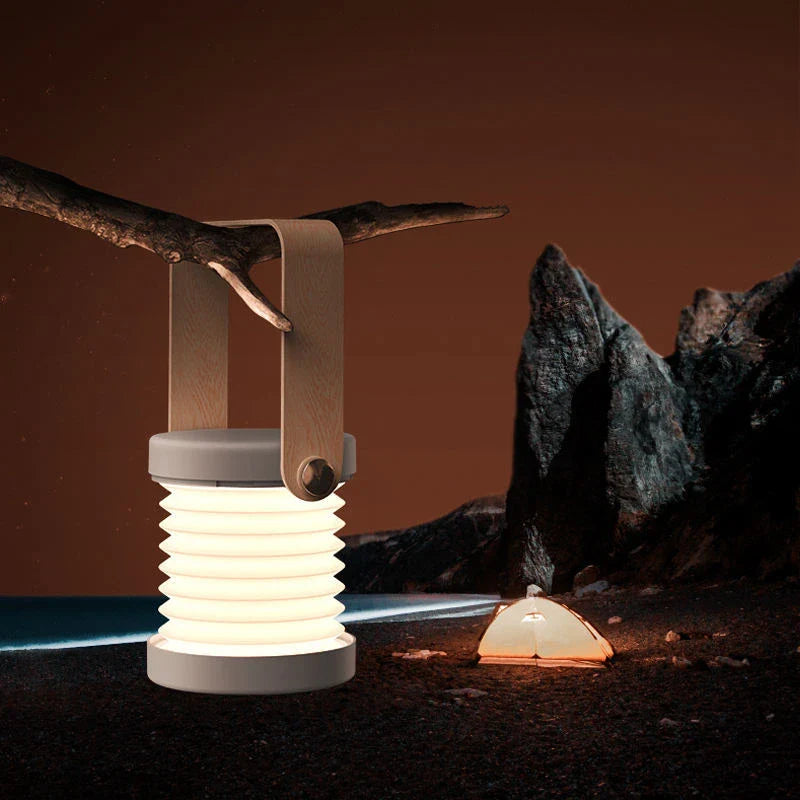 Elegant foldable LED lamp with touch-controlled dimming, rechargeable battery, and modern design for home decor