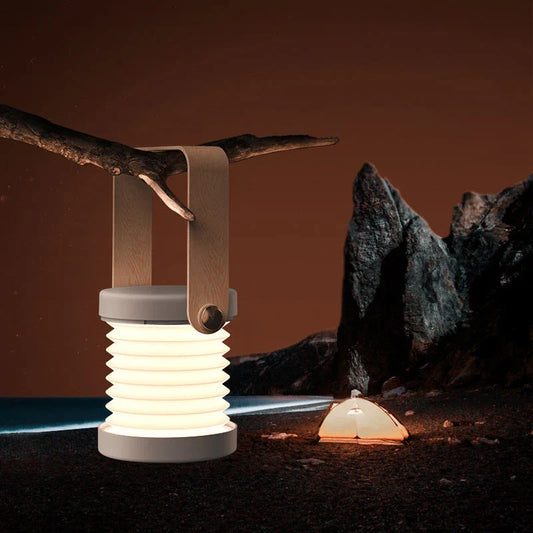 Elegant foldable LED lamp with touch-controlled dimming, rechargeable battery, and modern design for home decor