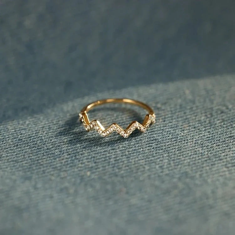 Adjustable wave pattern zircon ring in 925 silver with gold or silver electroplated finish