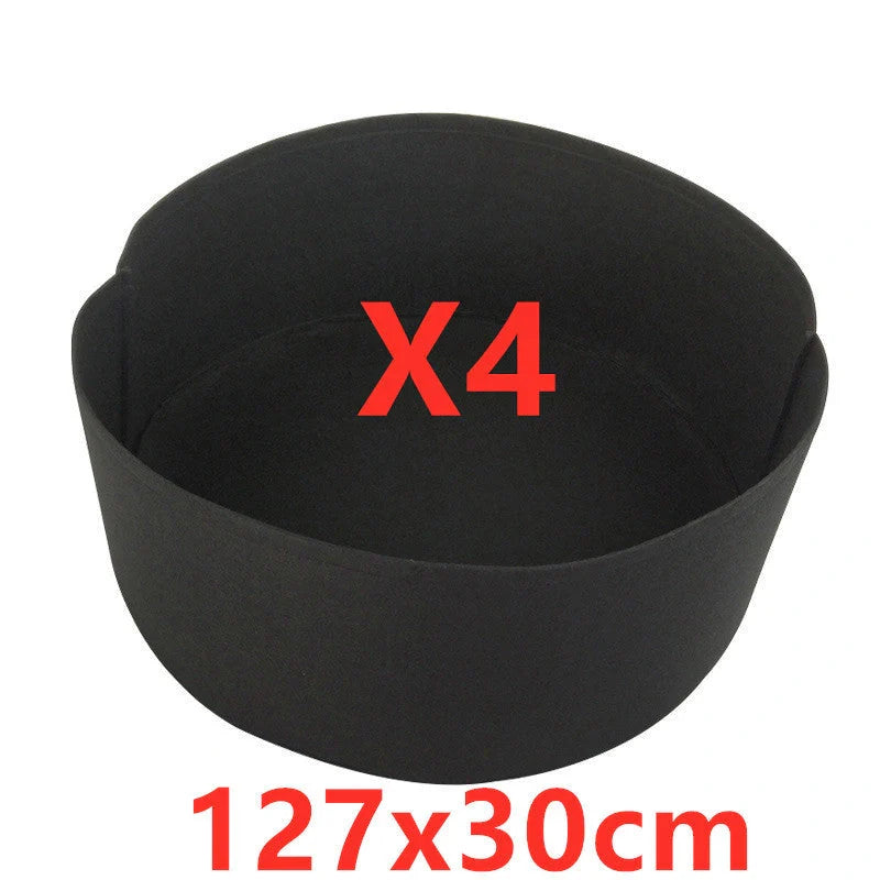 Round black and green fabric grow bags for garden plants with automatic drainage