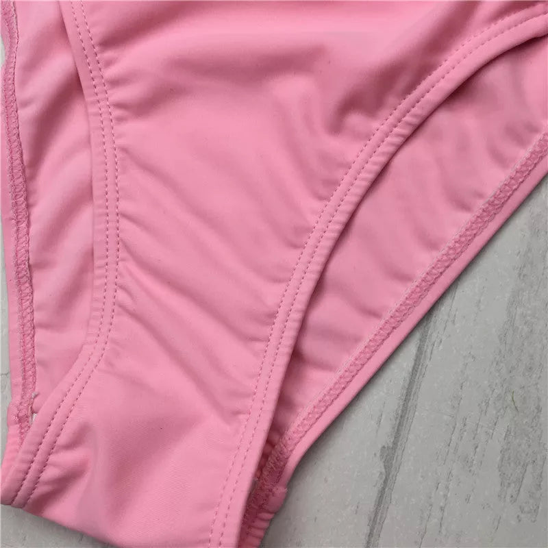 Pink bandage cut-out halter bikini swimsuit for women with stylish design
