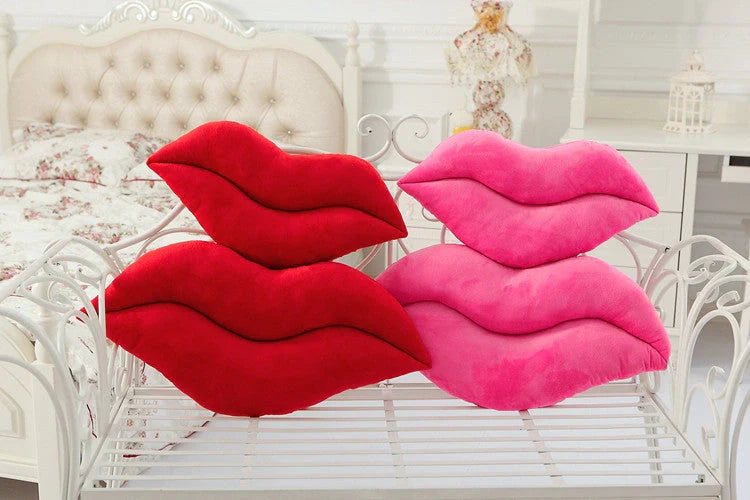 Adorable lip-shaped plush pillow for children in pink and red, perfect for cuddles and decor