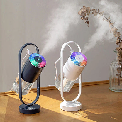 Compact USB Powered Desktop Humidifier with Ambient Lighting, featuring adjustable mist nozzle and romantic starry projection