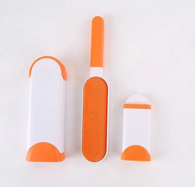 A reusable pet hair remover comb with a self-cleaning base, perfect for removing fur and lint from sofas, chairs, and other upholstery.
