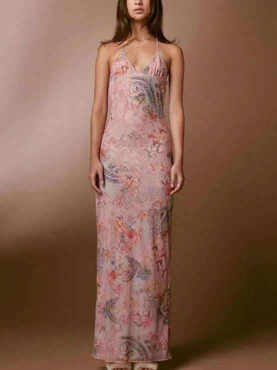 Stylish floral halter dress with spaghetti straps and butterfly back design, available in various vibrant colors