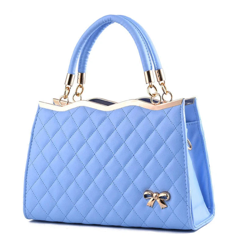 Elegant crossbody shoulder bag with decorative bow in high-quality PU leather