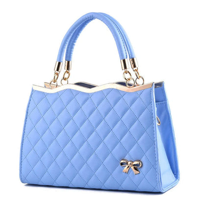 Elegant crossbody shoulder bag with decorative bow in high-quality PU leather