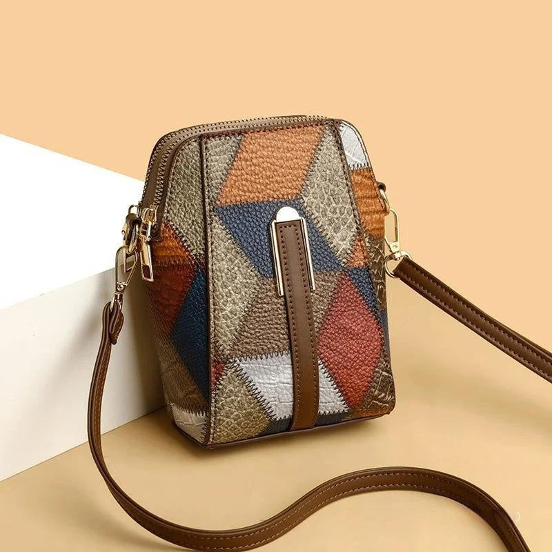 Stylish leather shoulder bag with distinctive stitching and versatile design for everyday wear