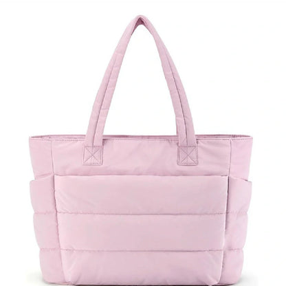 Premium cotton handbag with spacious design, secure zip-top closure, and thoughtful interior organisation for daily use