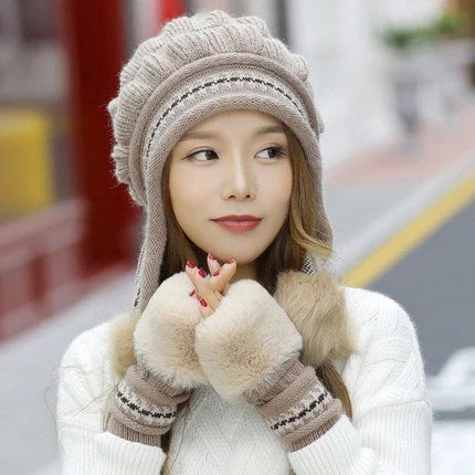 Knit fleece beanie with ear flaps and pompom in various colours for winter warmth