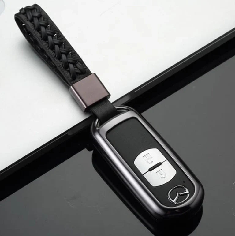 Aluminium alloy key case for Mazda with CNC engraving in sapphire, blue, grey, and rose gold