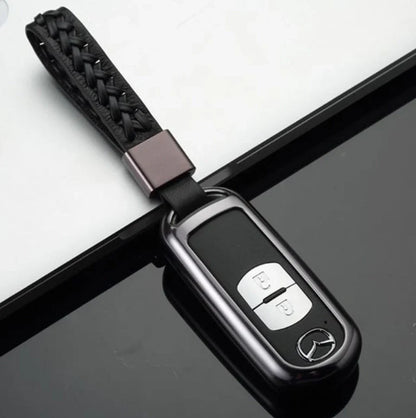 Aluminium alloy key case for Mazda with CNC engraving in sapphire, blue, grey, and rose gold