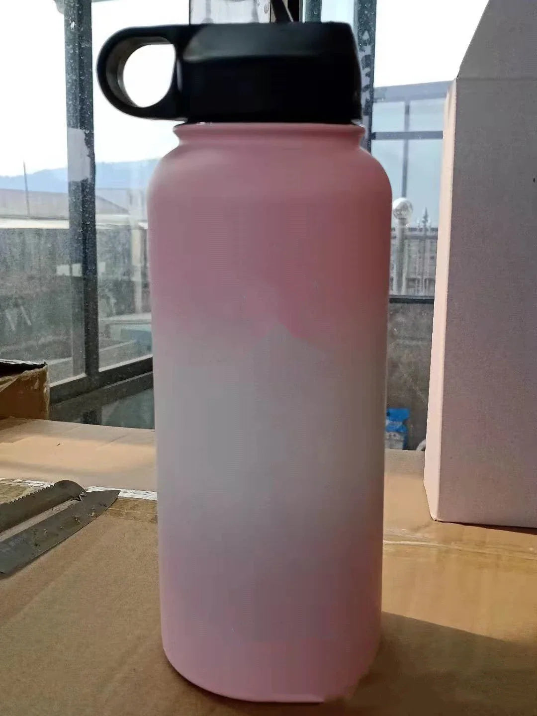 Premium stainless steel insulated tumbler with push-button lid and sleek design for outdoor adventures and active lifestyles.