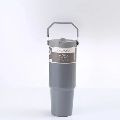 Stainless steel insulated tumbler with handle, available in multiple colors and sizes, designed to keep drinks hot or cold for hours.