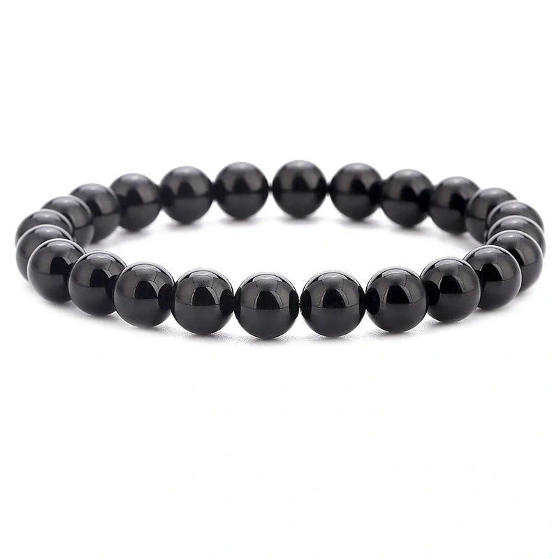 Natural Black Lava Rock and White Stone Stretch Bracelet showcasing unique natural stone beads
