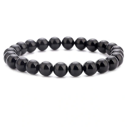 Natural Black Lava Rock and White Stone Stretch Bracelet showcasing unique natural stone beads