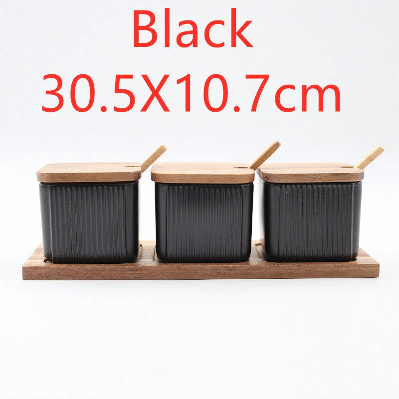 Stylish ceramic seasoning box set with sleek matte finish and airtight lids, perfect for organising spices in a modern British kitchen