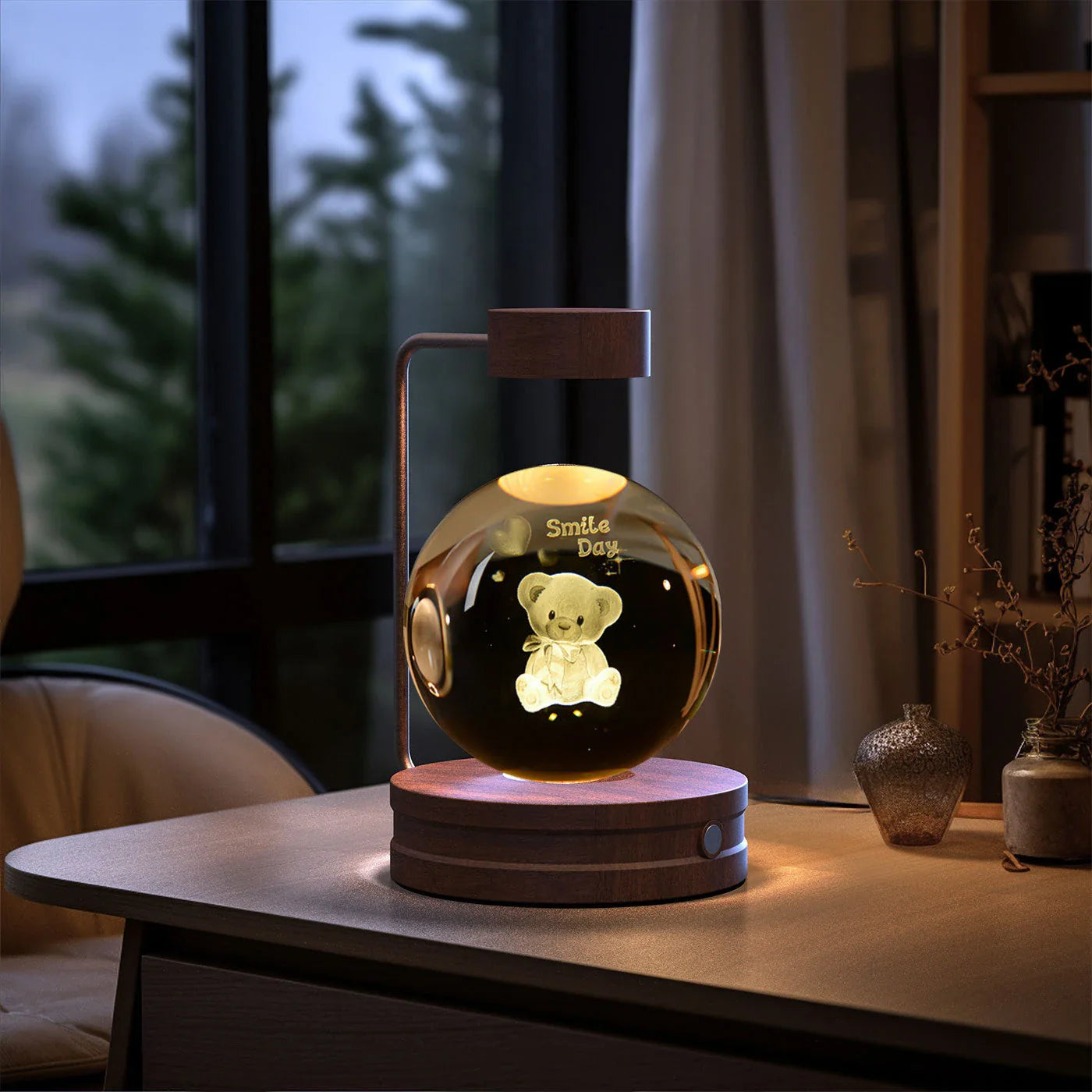 Enchanting crystal ball night light with cosmic designs, creating a warm and soothing ambiance in any room.